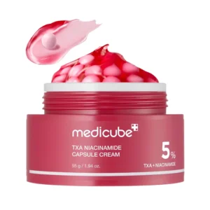Medicube TXA Niacinamide Capsule Cream open tub showing pink capsules and gel texture.